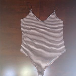 Peachy pink white and black striped body suit